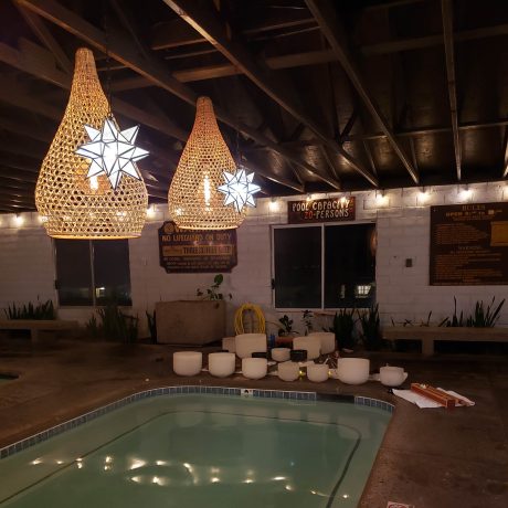 pool with lighting and bowls